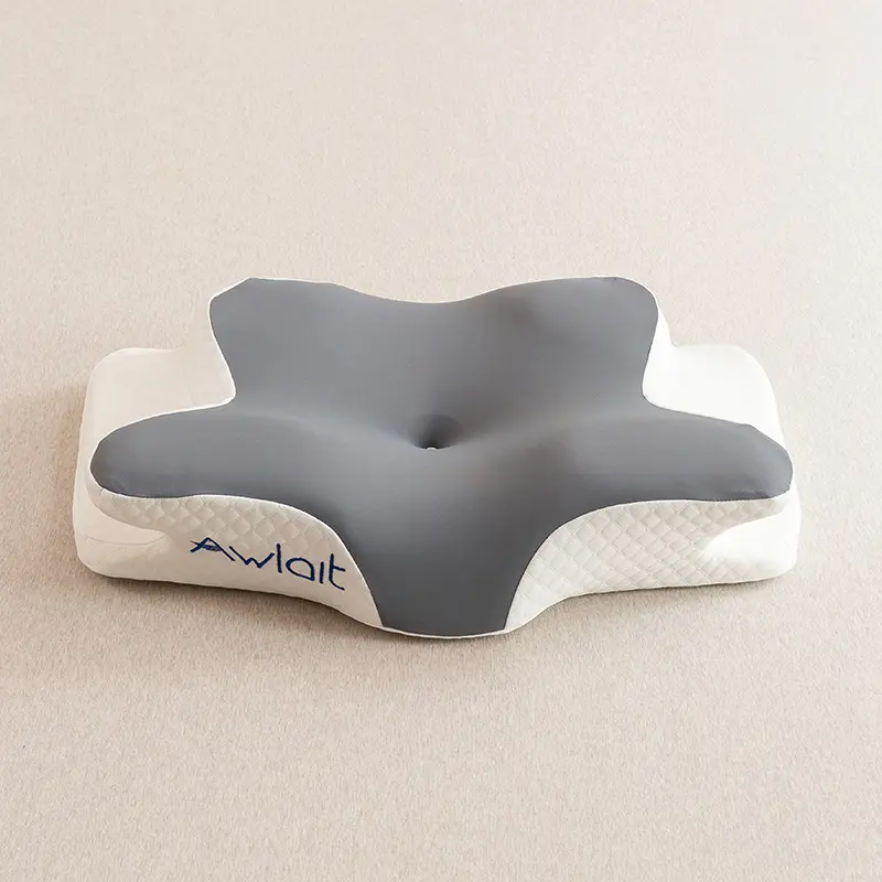 Ergonomic cervical pillow supporting neck curve to reduce stiffness and improve sleep quality